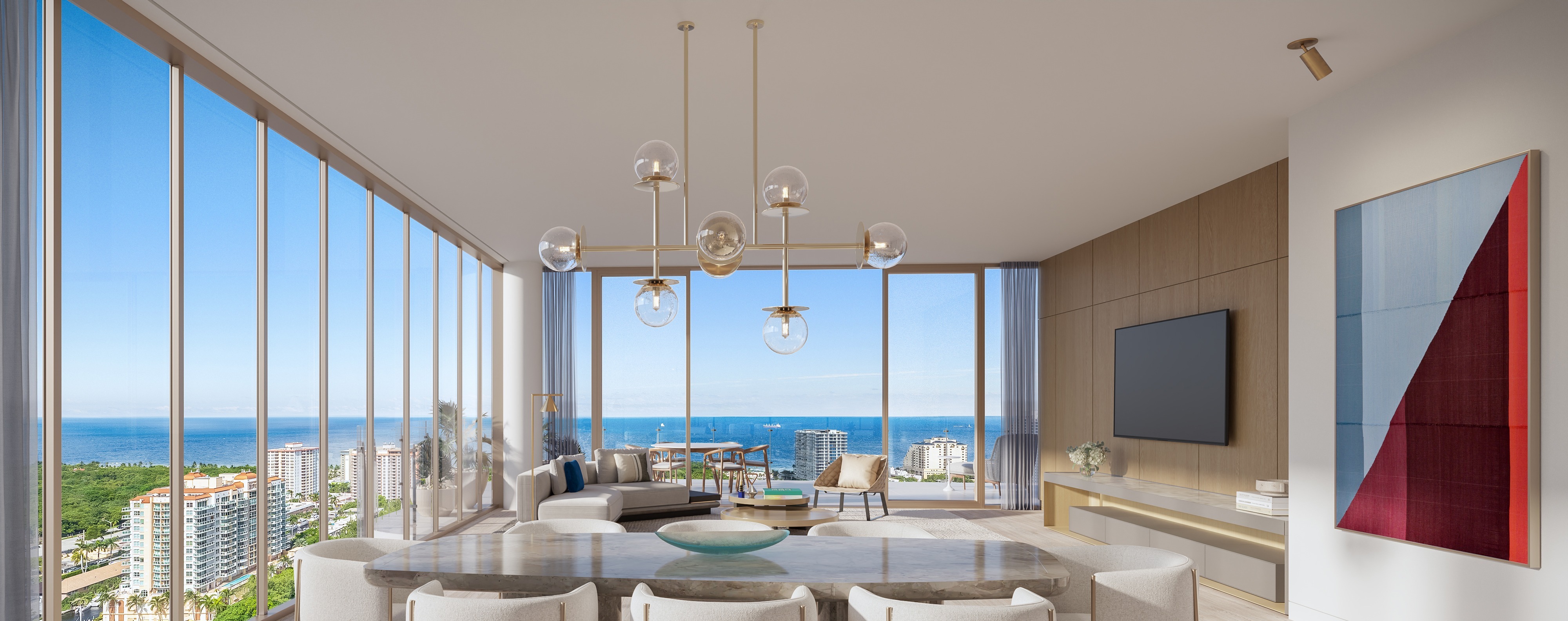 Great room at Sage Intracoastal Residences. BAMO interior architecture, 10-foot ceilings, floor-to-ceiling impact-resistant glass opening onto a private terrace with summer kitchen, unobstructed Intracoastal and Atlantic Ocean views.